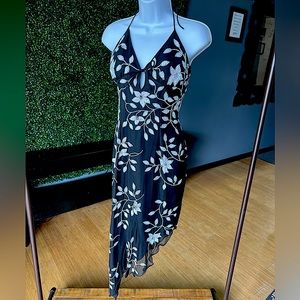 Cache short black/ white beaded cocktail dress with adjustable halter strap.